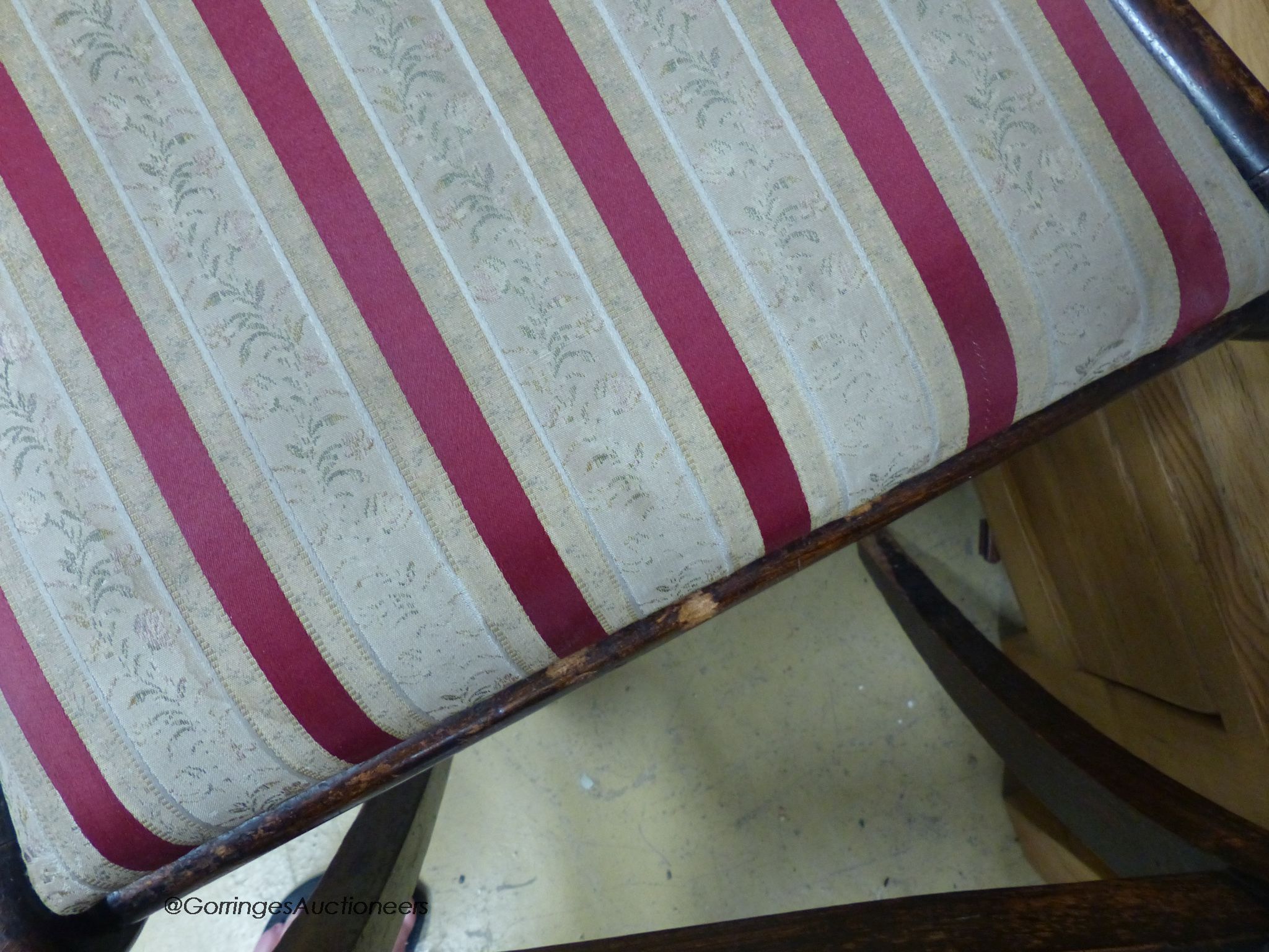 A set of five Regency brass inlaid simulated rosewood cane seated dining chairs